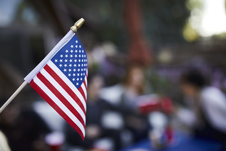 blurry-people-celebrating-with-american-flag sm